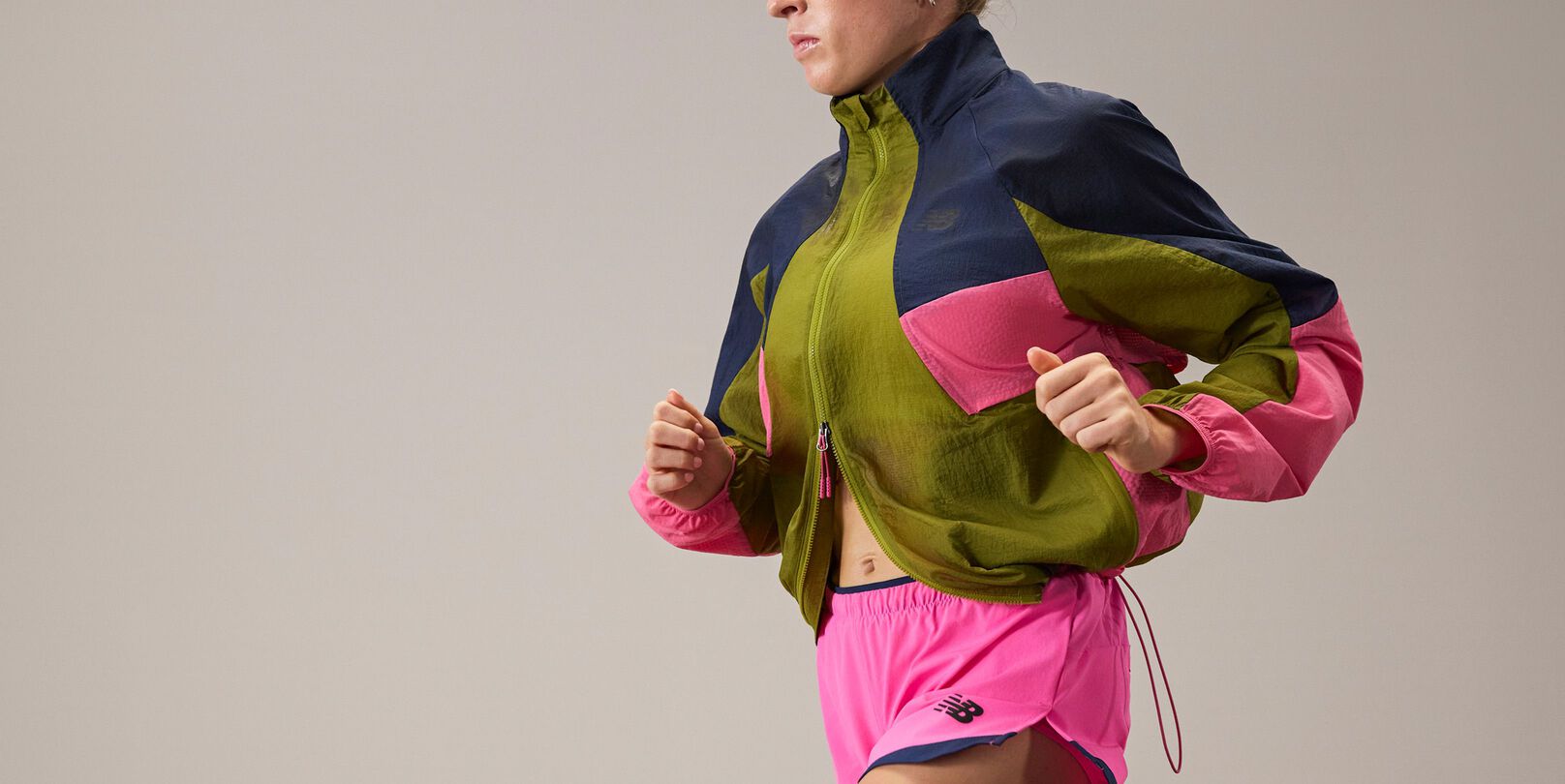 Margot Appleton running and wearing RC apparel. 